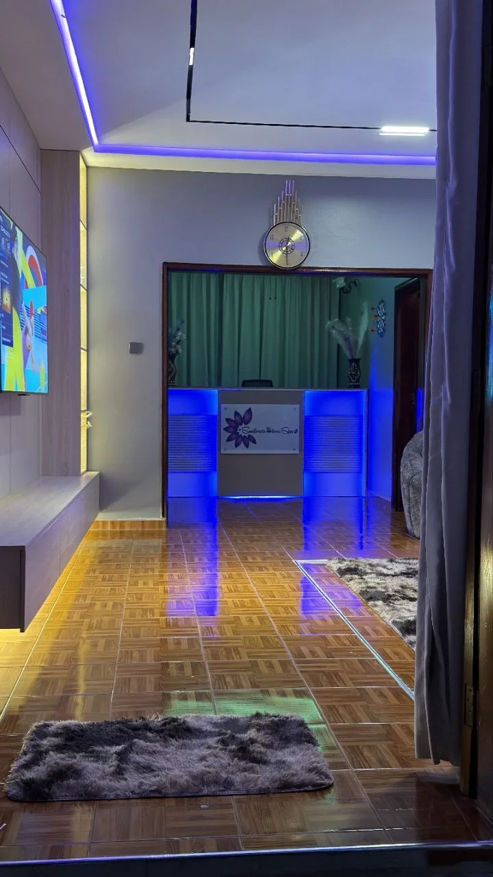 Sunflower Spa reception with soft coloured lighting
